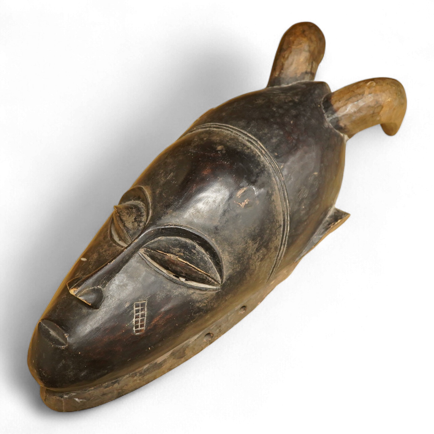 African tribal art interest; a Senufo mask of the Ivory Coast, 41cm